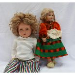 A Shirley Temple doll, by |Ideal, with curly blond hair closing eyes and open mouth with teeth,