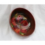 A Moorcroft pottery flambe bowl, decorated in the hibiscus pattern, impressed mark, 15.
