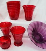 Five Powell of Whitefriars ruby ribbon trailed glass vases,