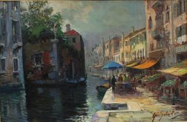 20th century Italian School A Venetian canal scene Oil on canvas Indistinctly signed 55 x 86cm