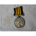 An Ashantee Medal, issued to W Yandall, Painter H.M.S.