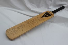 A Duncan Fearnley Cricket bat, signed by The Glamorgan and Kent teams, including Neil Taylor,