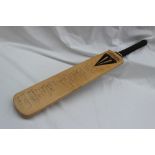 A Duncan Fearnley Cricket bat, signed by The Glamorgan and Kent teams, including Neil Taylor,