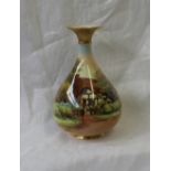 A Royal Worcester porcelain baluster vase with a flared top painted with a cottage scene titled