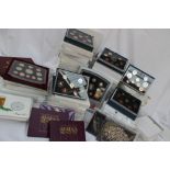 A large collection of Royal Mint United Kingdom Proof coin sets,