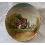 A Royal Worcester porcelain bowl of circular form on a circular foot,