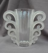 A Lalique Beauvais vase with a tapering decagon cylindrical body with five graduated scrolling