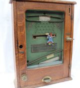 The "Clown" Pickwick - An oak cased coin operated arcade game, No.572B Patent No.23431/1900, 46.