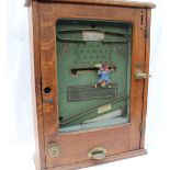 The "Clown" Pickwick - An oak cased coin operated arcade game, No.572B Patent No.23431/1900, 46.