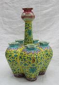 A 19th century Chinese porcelain Famille Jaune tulip vase, the central stem with a bulb top,