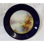 A Royal Worcester porcelain plate, transfer and infil decorated with woodcock, titled 'Ruff',