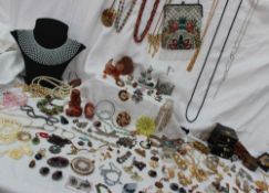 A large quantity of costume jewellery, including bracelets, brooches, earrings,