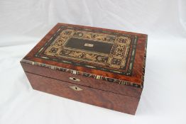 A Victorian inlaid burr walnut laptop desk, the interior with a sloping fall and ink wells, 37.