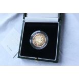An Elizabeth II 1997 Gold Proof £2 coin,
