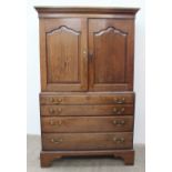 A 19th century mahogany linen press / secretaire,