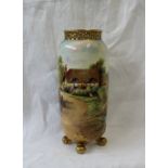 A Royal Worcester porcelain circular tall vase with reticulated top, on four scrolled feet,