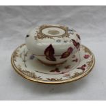 A Daniel porcelain inkwell of bulbous form with integral tray, painted with flower heads and leaves,