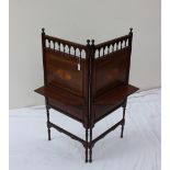 An Edwardian mahogany two panel folding fire screen,