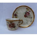 A Royal Worcester porcelain tea cup and saucer,