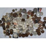 A collection of coins including six pence's,