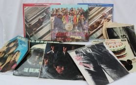 A collection of 33rpm albums including Beatles - 'Sgt Peppers Lonely Hearts Club Band',