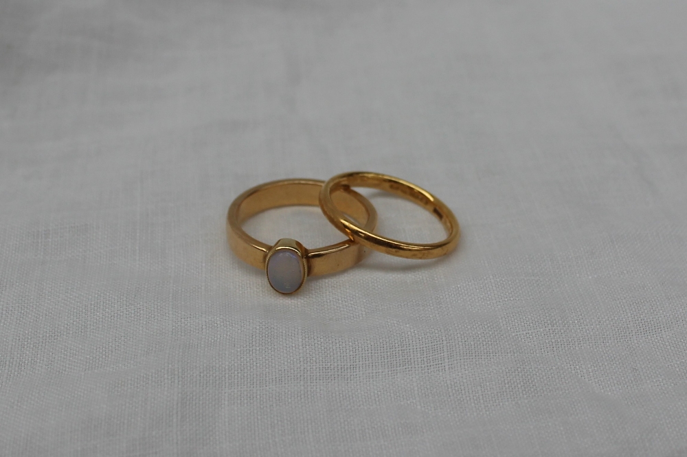 A 22ct yellow gold wedding band, approximately 3 grams, - Image 2 of 8