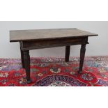 A 17th century oak side table,