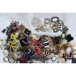 A large collection of costume jewellery including bead necklaces, earrings, bracelets,