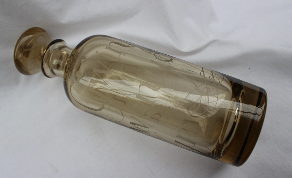A light green glass cylindrical decanter and stopper inscribed "Gwin, yr hwn a lawenycha galon dyn", - Image 5 of 8