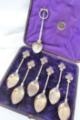 A set of six Victorian silver gilt spoons with a pierced trefoil top,