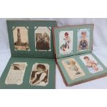 Two postcard albums containing circa 180 postcards including floral studies, Peter Pan, Elves,