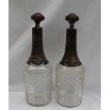 A pair of 19th century French silver and cut glass decanters, makers mark for Paul Frey,