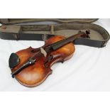 A German violin with a one piece back, ebonised stringing, bears a label "Francisco Ruggeri",