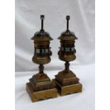 A pair of champleve enamel and gilt metal lamp bases, of twin handled urn shape,