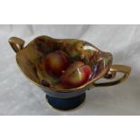 A Royal Worcester porcelain two handled pedestal bowl,