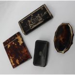 A papier mache snuff box of rectangular form, inset with white metal figures, 10.