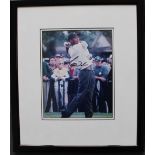 Tiger Woods a signed colour action photograph, Prints of Bel Air Certificate of Authenticity,
