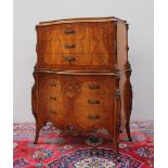 A continental burr walnut and mahogany chest on chest,