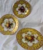 A set of three Royal Worcester porcelain cabinet plates painted with peaches and gooseberries by