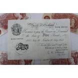 A Bank of England white five pound note, dated 16 July 1955, chief cashier L. K. O’Brien No.