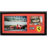 Michael Schumacher a signed colour photograph with inset photograph and Ferrari symbol, 17.