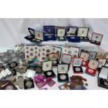 A large collection of Silver and base metal coins, including a 1989 £2 silver proof two coin set,