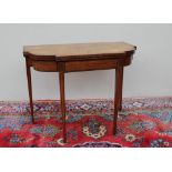 A 19th century satinwood card table, the shaped top on a gateleg action,