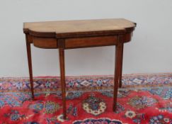 A 19th century satinwood card table, the shaped top on a gateleg action,