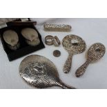 A pair of Elizabeth II silver backed hair brushes with matching silver backed comb, Birmingham,