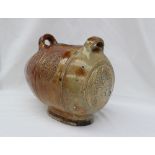 A stoneware barrel or Costrel, possibly 17th century with two ring handles,