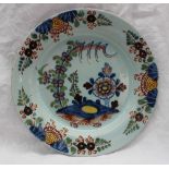 An 18th century Bristol delft polychrome decorated plate, decorated with flowers and leaves, 22.