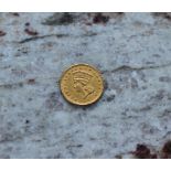 An 1861 United States of America 1 Dollar gold coin
