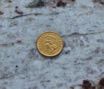 An 1861 United States of America 1 Dollar gold coin