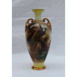 A Royal Worcester Hadley ware porcelain twin handled vase, with a flared neck,